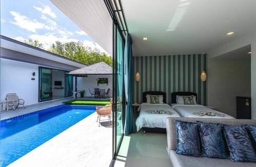 Si Sunthon Villa | Lespalm Resort by Vacayandco