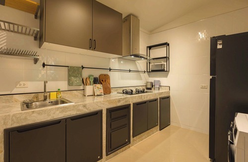 Sathorn House | Oasis Thai Teak Home in Sathorn