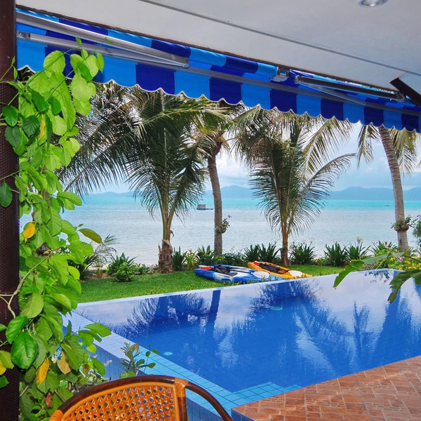 Superb Beachfront Villa with private Pool & Jacuzzi in tropical garden.