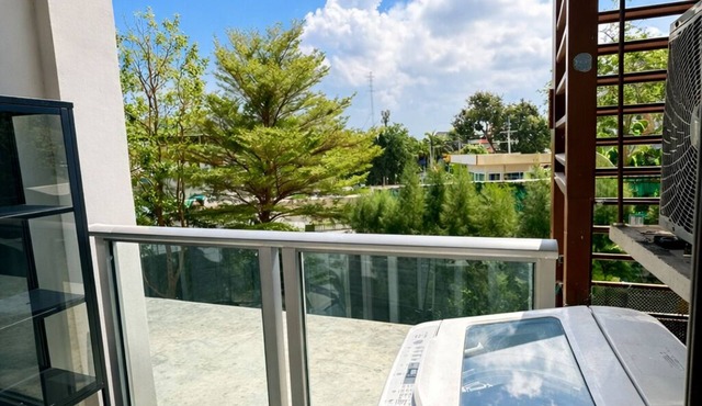 Luxury Balcony View with Open Sky and Greenery