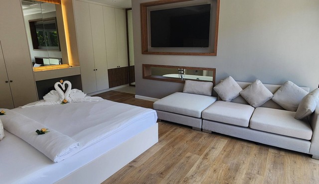 Spacious 3-bedroom condo with WiFi, AC. Nice View, Large Balcony,Fully furnished