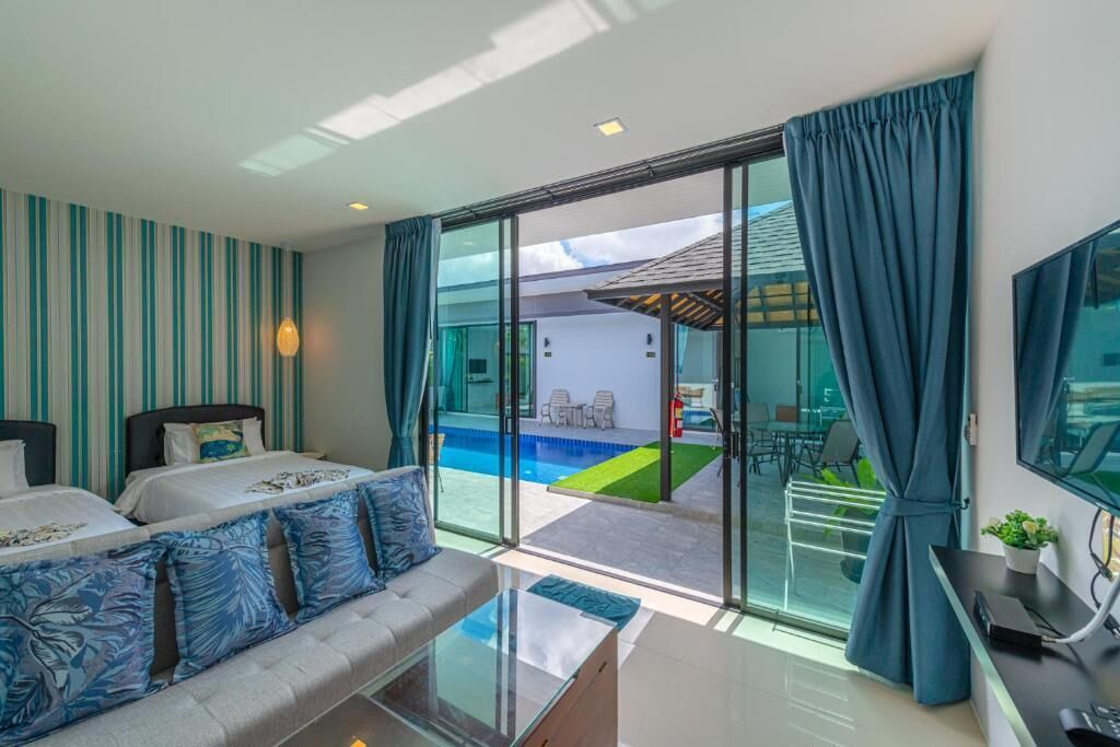 Si Sunthon Villa | Lespalm Resort by Vacayandco