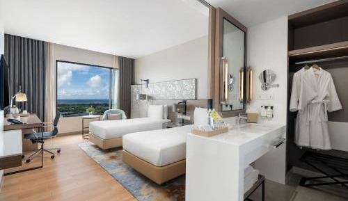 Two-Bedroom Suite with One King Bed and Two Single Beds