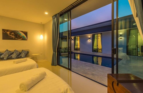 Si Sunthon Villa | Lespalm Resort by Vacayandco