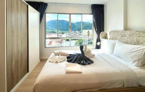 Kathu Apartment | Dcondo Kathu - Top Floor 1 Bdr Condo with shared Pool